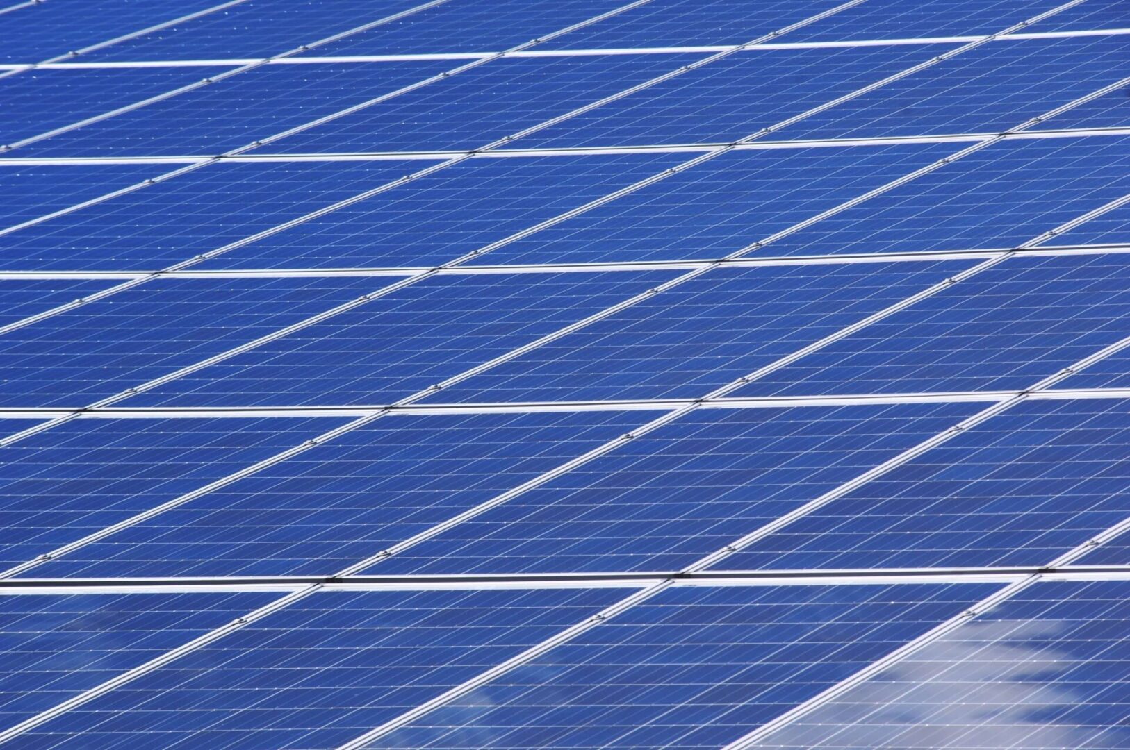 A close up of some solar panels on the ground